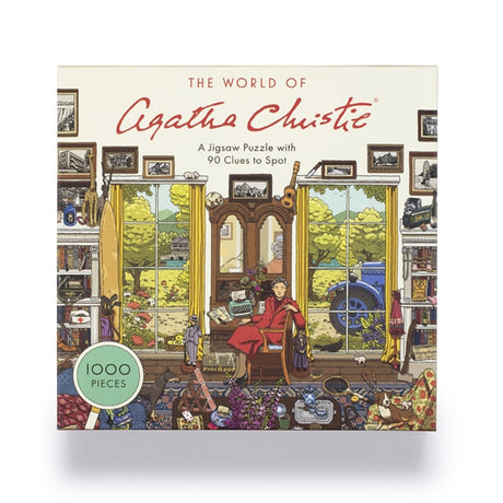 Jigsaw puzzle box featuring a scene from 'The World of Agatha Christie' with a woman in a red dress sitting in a room.
