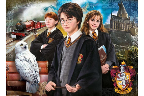 Three characters in Hogwarts robes with a snowy owl, train, and castle in the background